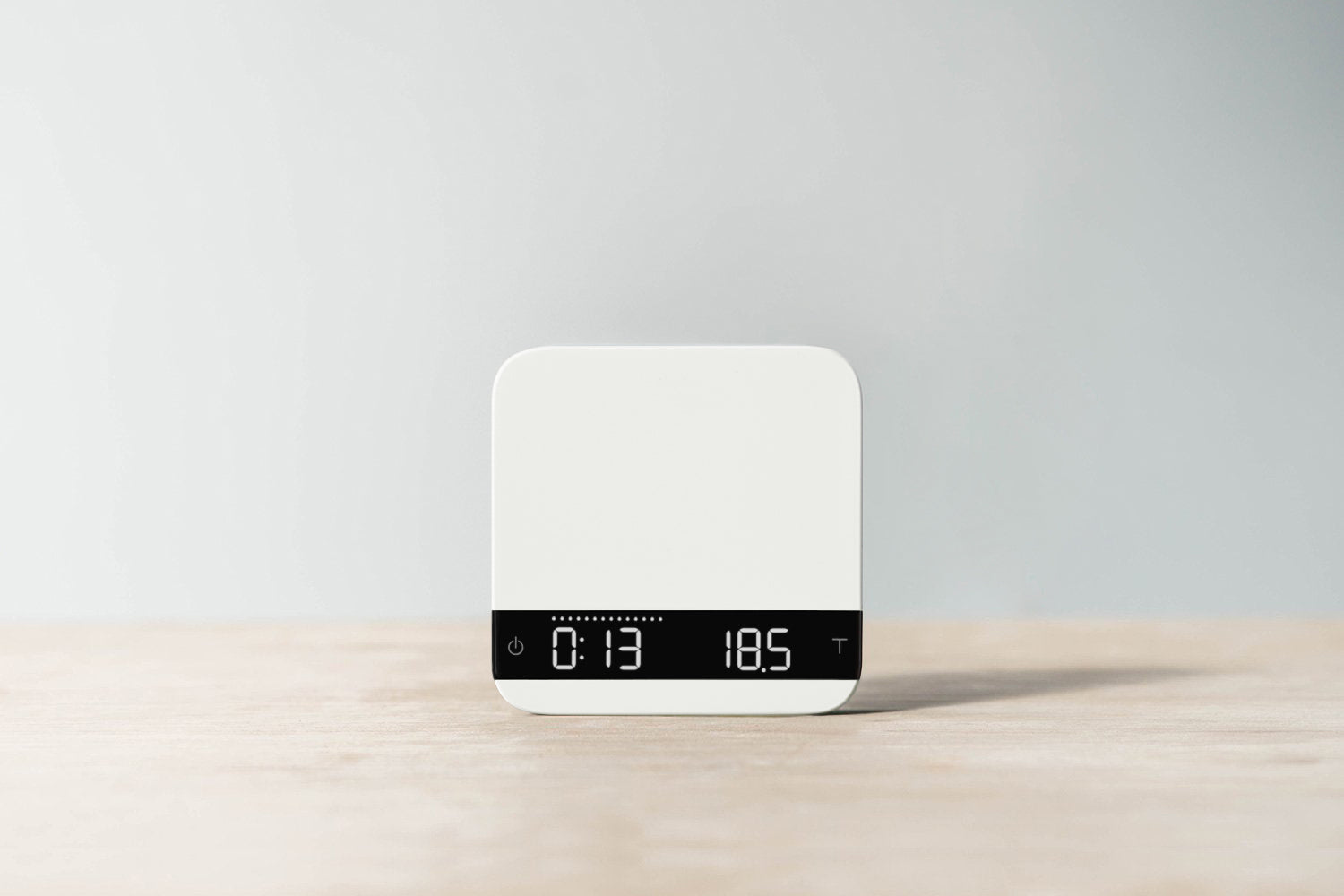 Acaia Lunar espresso scale in white showing time and weight